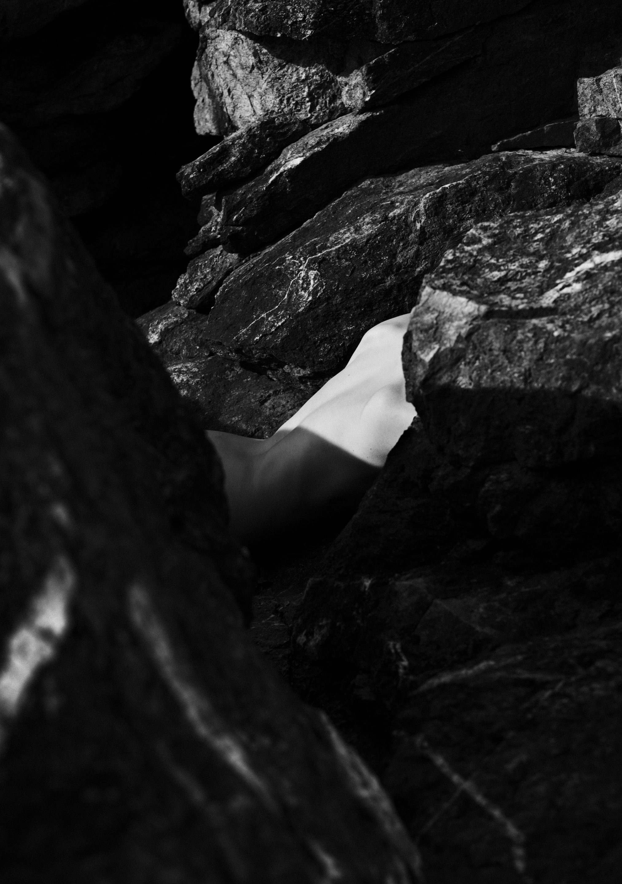 SON VENIN and PERNILLE SANDBERG Naked body between brut rocks